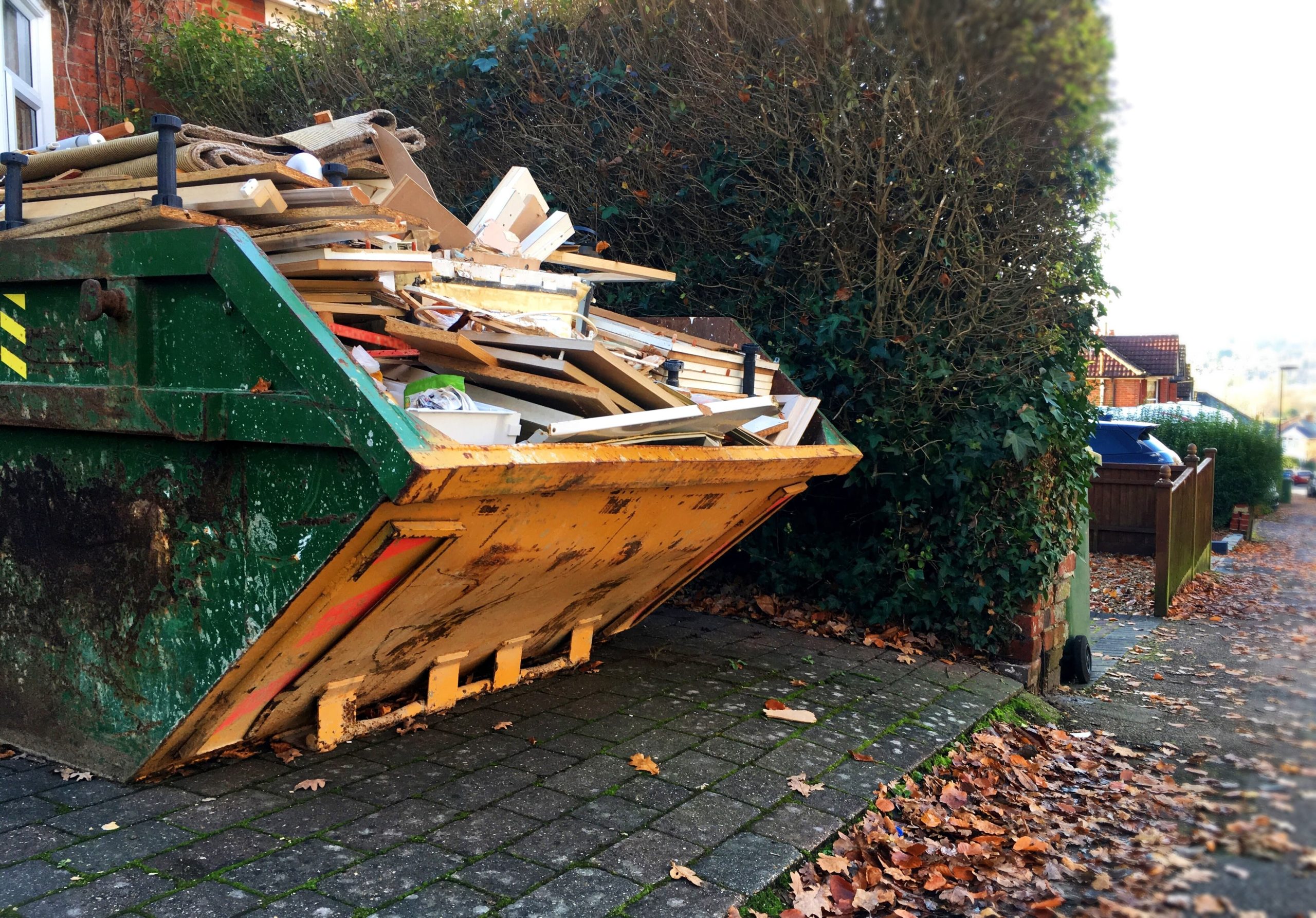 How can professional skip hire help you avoid legal troubles and fines?